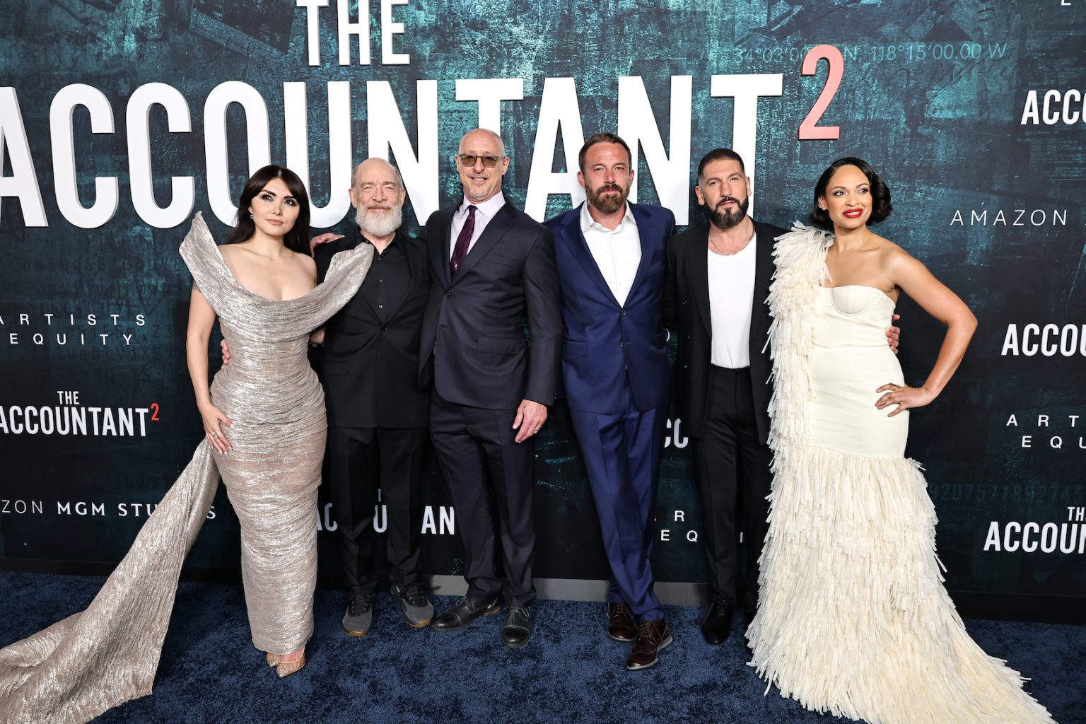 HOLLYWOOD, CALIFORNIA - APRIL 16: (L-R) Daniella Pineda, J.K. Simmons, director/executive producer Gavin O’Connor, producer Ben Affleck, Jon Bernthal and Cynthia Addai-Robinson seen at the Amazon MGM Studios "The Accountant 2" Los Angeles Premiere at TCL Chinese Theatre on April 16, 2025 in Hollywood, California. (Photo by Eric Charbonneau/Amazon MGM Studios via Getty Images)