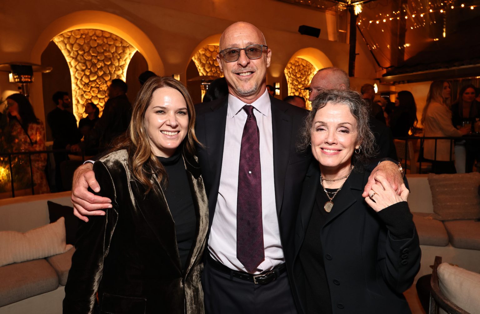 LOS ANGELES, CALIFORNIA - APRIL 16: (L-R) Julie Rapaport, Head of Film Creative and Strategy, Amazon MGM Studios, director/executive producer Gavin O'Connor and Courtenay Valenti, Head of Film, Streaming, and Theatrical, Amazon MGM Studios, seen at the Amazon MGM Studios "The Accountant 2" Los Angeles Premiere after party at Laya Restaurant on April 16, 2025 in Los Angeles, California. (Photo by Eric Charbonneau/Amazon MGM Studios via Getty Images)