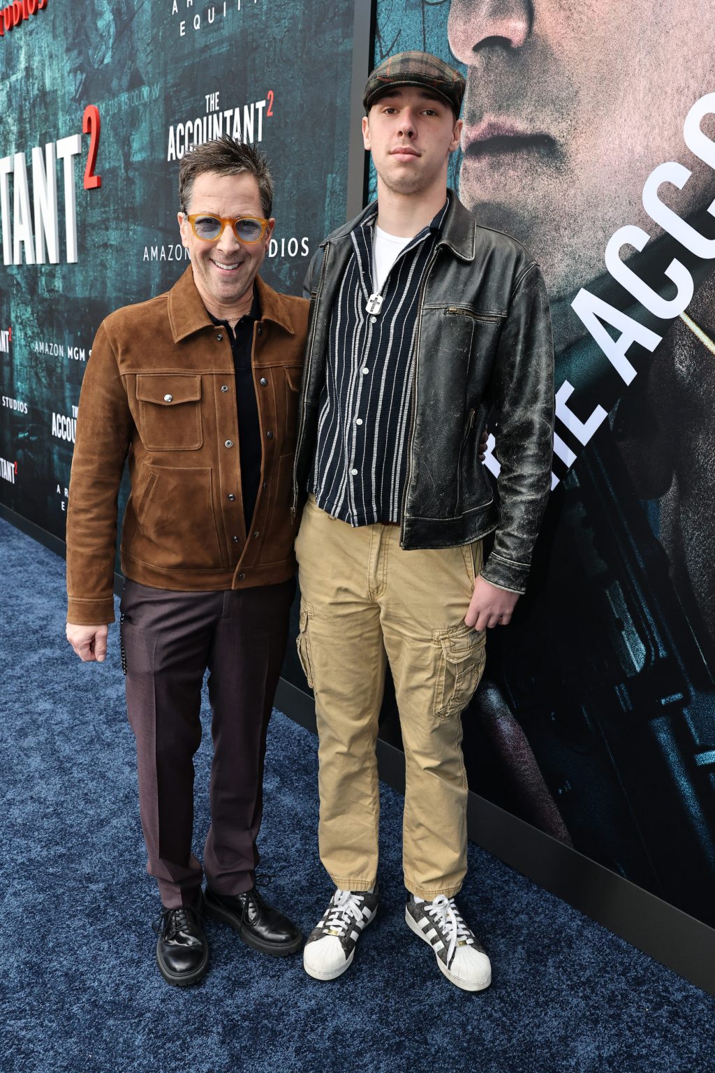 HOLLYWOOD, CALIFORNIA - APRIL 16: Dan Bucatinsky (L) and guest seen at the Amazon MGM Studios "The Accountant 2" Los Angeles Premiere at TCL Chinese Theatre on April 16, 2025 in Hollywood, California. (Photo by Eric Charbonneau/Amazon MGM Studios via Getty Images)
