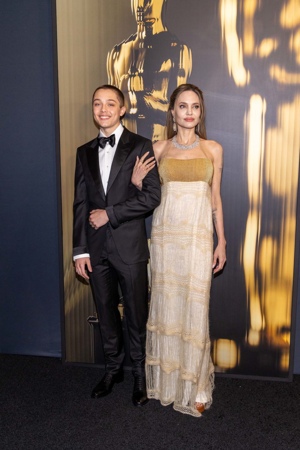 Knox Jolie-Pitt and Angelina Jolie arrive at the 15th Governors Awards in the Ray Dolby Ballroom at Ovation Hollywood on Sunday, November 17, 2024.