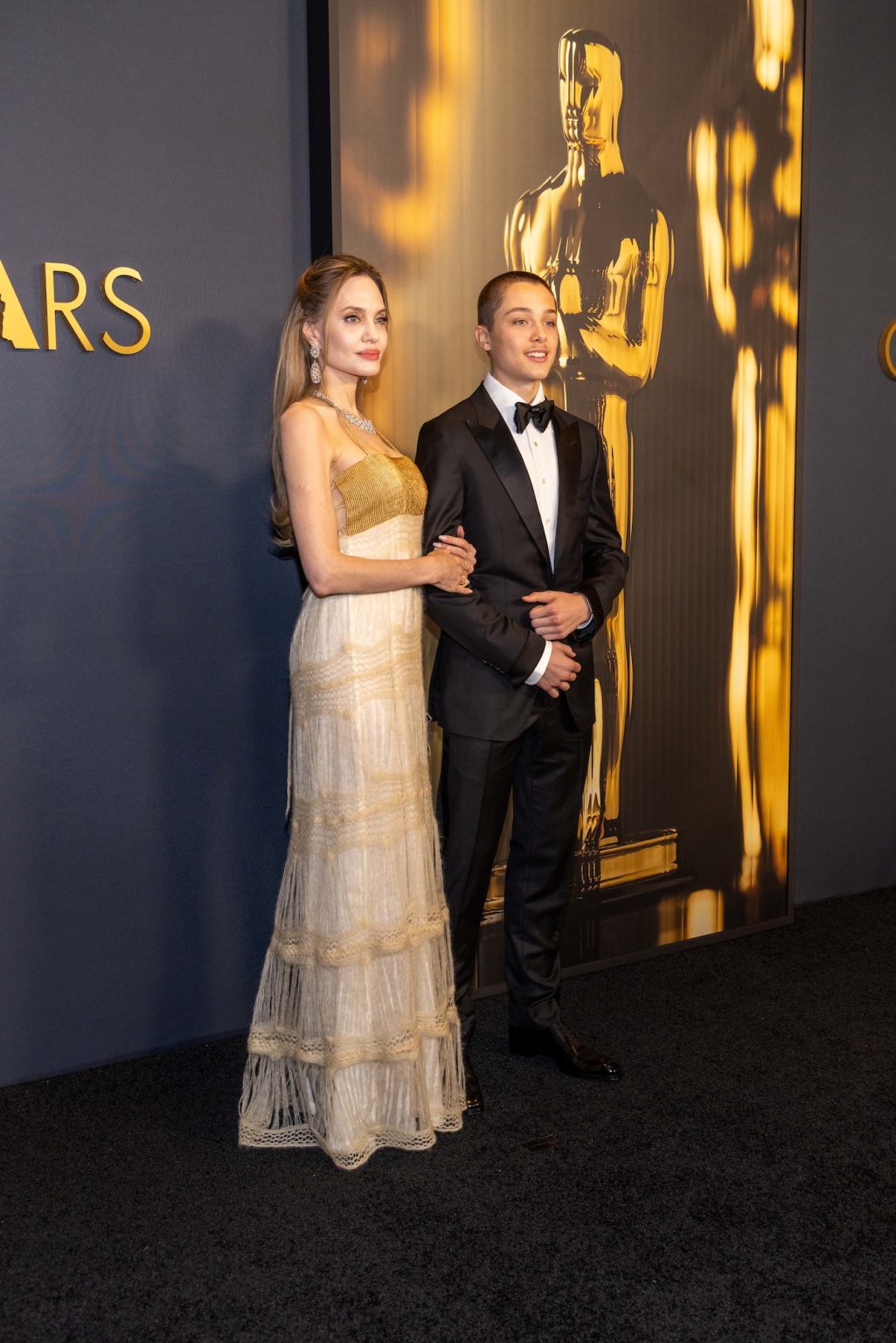 Knox Jolie-Pitt and Angelina Jolie arrive at the 15th Governors Awards in the Ray Dolby Ballroom at Ovation Hollywood on Sunday, November 17, 2024.