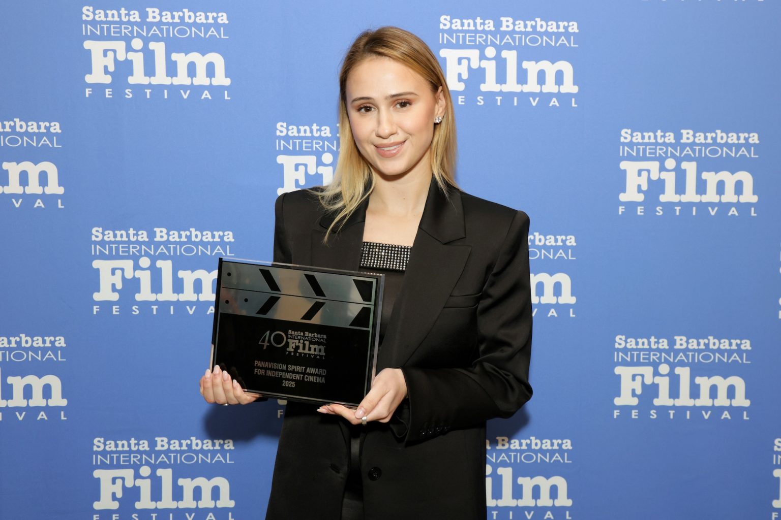 SANTA BARBARA, CALIFORNIA - FEBRUARY 15: Maria Bakalova poses with the Panavision Spirit Award for Independent Cinema for "O Horizon" at the Awards Breakfast during the 40th Santa Barbara International Film Festival at El Encanto on February 15, 2025 in Santa Barbara, California. (Photo by Rebecca Sapp/Getty Images for Santa Barbara International Film Festival)