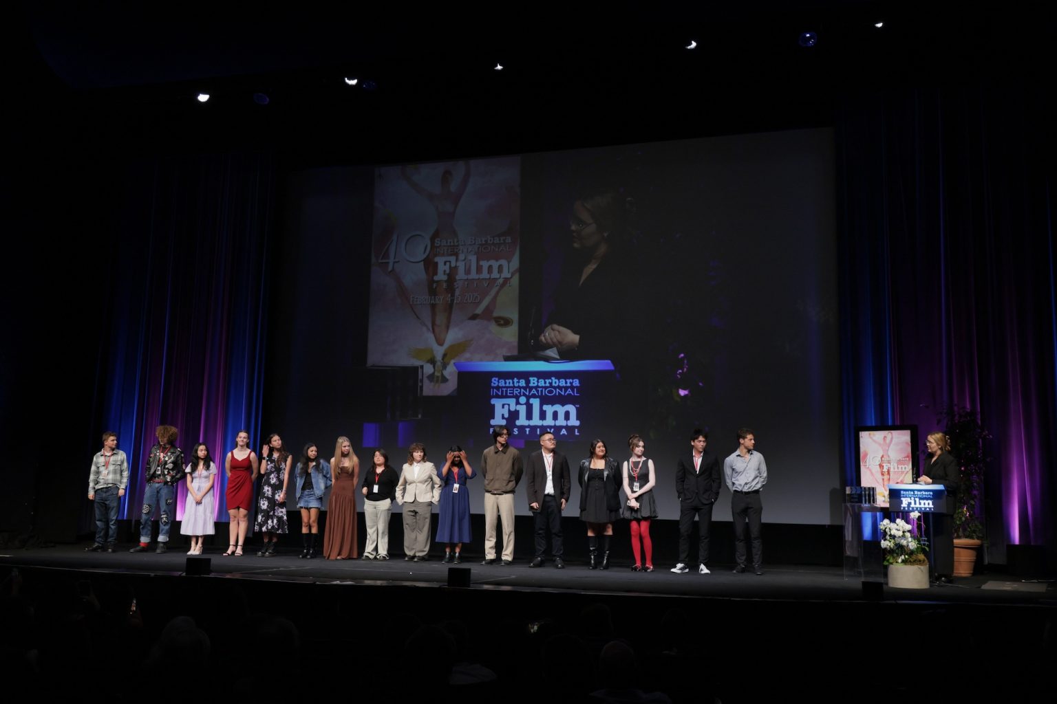 SANTA BARBARA, CALIFORNIA - FEBRUARY 15: Claire Waterhouse (R) and student filmmakers speak onstage at the 10-10-10 Awards during the 40th Santa Barbara International Film Festival at The Arlington Theatre on February 15, 2025 in Santa Barbara, California. (Photo by Rebecca Sapp/Getty Images for Santa Barbara International Film Festival)