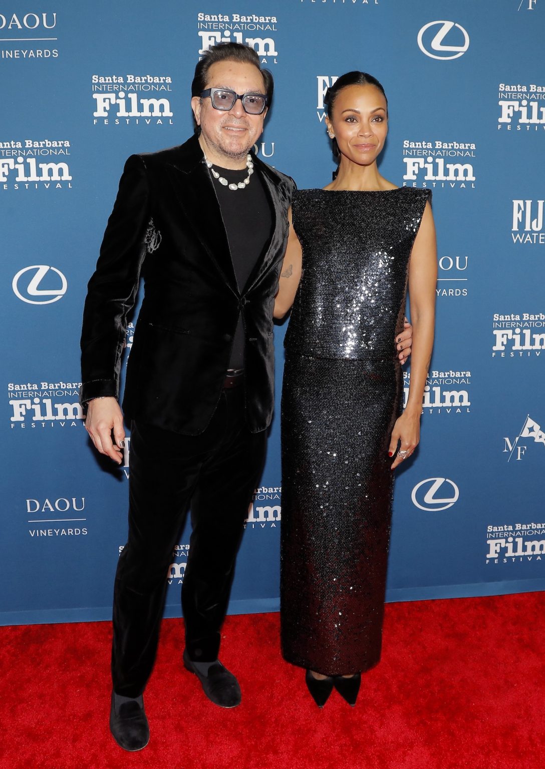 SANTA BARBARA, CALIFORNIA - FEBRUARY 12:SBIFF Executive Director Roger Durling and Zoe Saldaña attend the American Riviera Award ceremony during the 40th Santa Barbara International Film Festival at The Arlington Theatre on February 12, 2025 in Santa Barbara, California. (Photo by Tibrina Hobson/Getty Images for Santa Barbara International Film Festival)