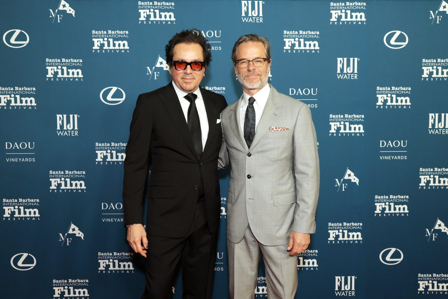 SANTA BARBARA, CALIFORNIA - FEBRUARY 13: (L-R) SBIFF Executive Director Roger Durling and honoree Guy Pearce attend the Cinema Vanguard Award ceremony during the 40th Santa Barbara International Film Festival at The Arlington Theatre on February 13, 2025 in Santa Barbara, California. (Photo by Rebecca Sapp/Getty Images for Santa Barbara International Film Festival)