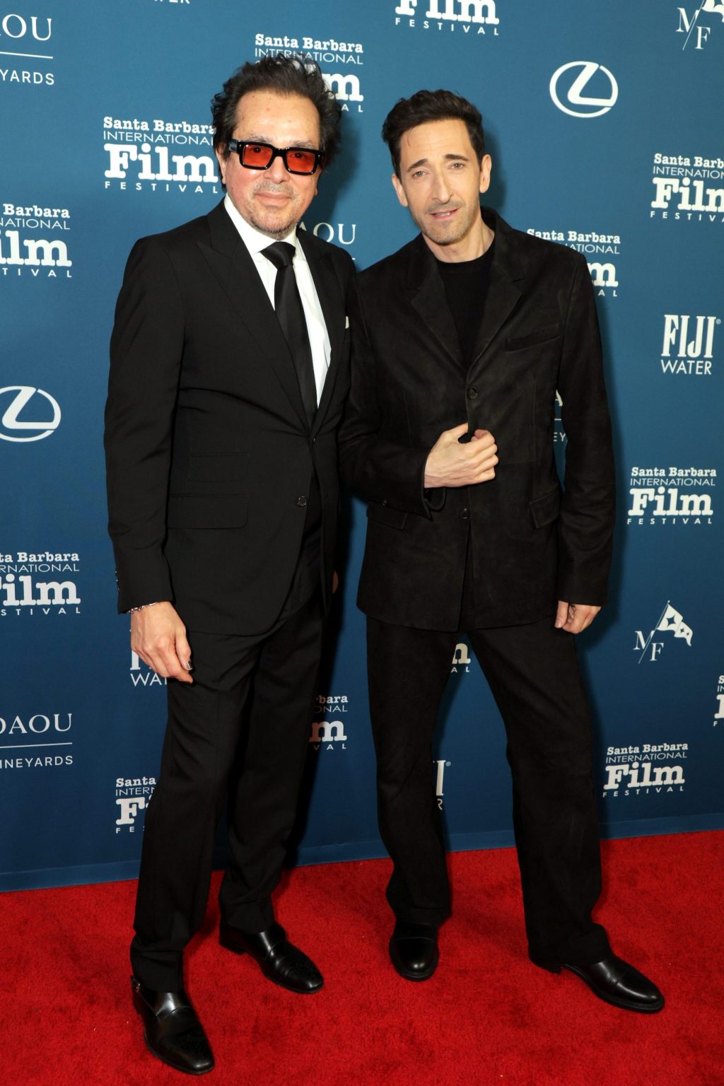 SANTA BARBARA, CALIFORNIA - FEBRUARY 13: (L-R) SBIFF Executive Director Roger Durling and honoree Adrien Brody attend the Cinema Vanguard Award ceremony during the 40th Santa Barbara International Film Festival at The Arlington Theatre on February 13, 2025 in Santa Barbara, California. (Photo by Rebecca Sapp/Getty Images for Santa Barbara International Film Festival)