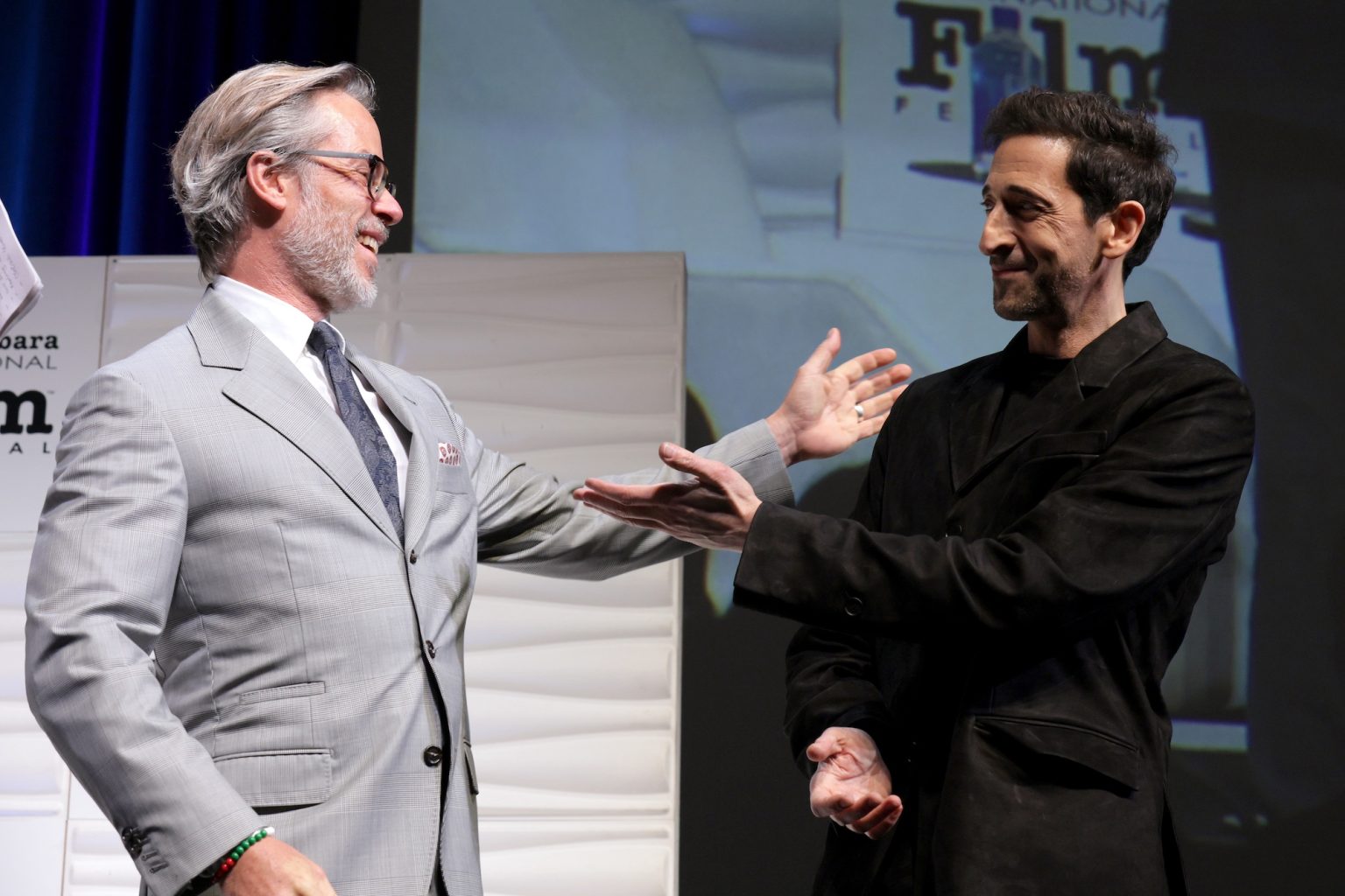 SANTA BARBARA, CALIFORNIA - FEBRUARY 13: Adrien Brody and Guy Pearce speak onstage at the Cinema Vanguard Award during the 40th Santa Barbara International Film Festival at The Arlington Theatre on February 13, 2025 in Santa Barbara, California. (Photo by Tibrina Hobson/Getty Images for Santa Barbara International Film Festival)