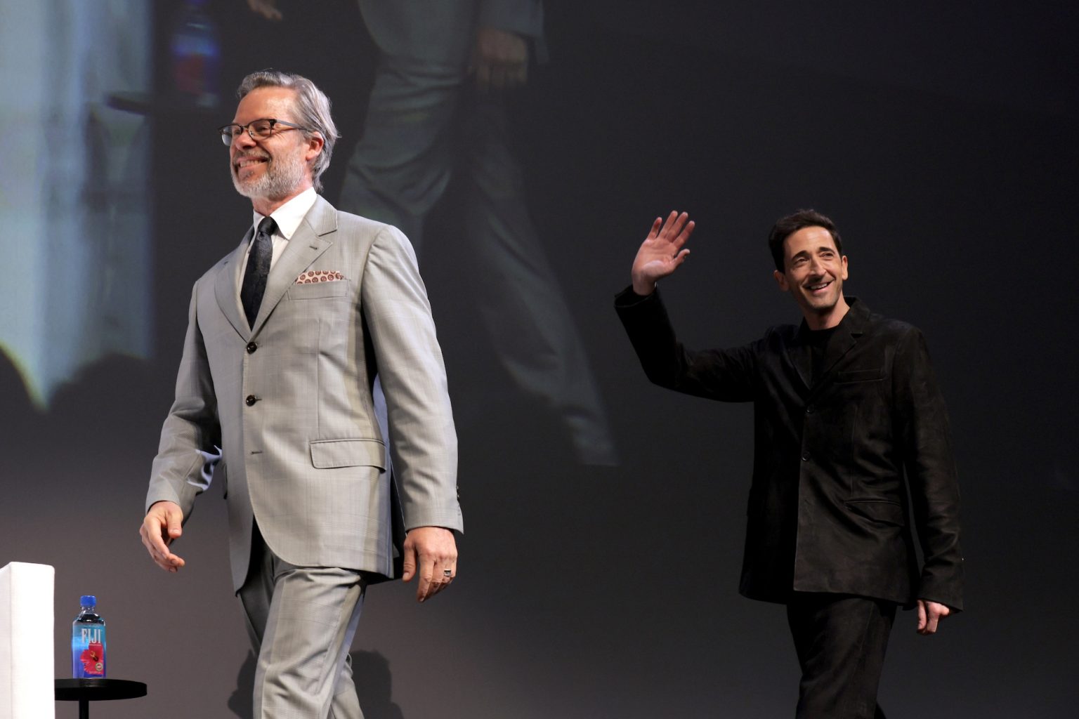 SANTA BARBARA, CALIFORNIA - FEBRUARY 13: Adrien Brody and Guy Pearce speak onstage at the Cinema Vanguard Award during the 40th Santa Barbara International Film Festival at The Arlington Theatre on February 13, 2025 in Santa Barbara, California. (Photo by Tibrina Hobson/Getty Images for Santa Barbara International Film Festival)