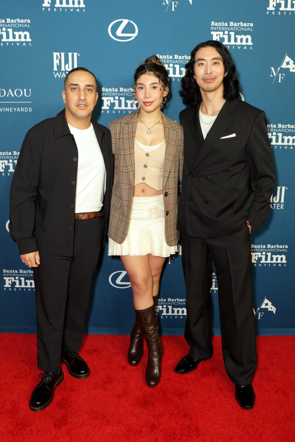 SANTA BARBARA, CALIFORNIA - FEBRUARY 13: (L-R) Adil Chamakh, Isabella Ferreira, and Justin Réi Ching attend the Cinema Vanguard Award ceremony during the 40th Santa Barbara International Film Festival at The Arlington Theatre on February 13, 2025 in Santa Barbara, California. (Photo by Rebecca Sapp/Getty Images for Santa Barbara International Film Festival)