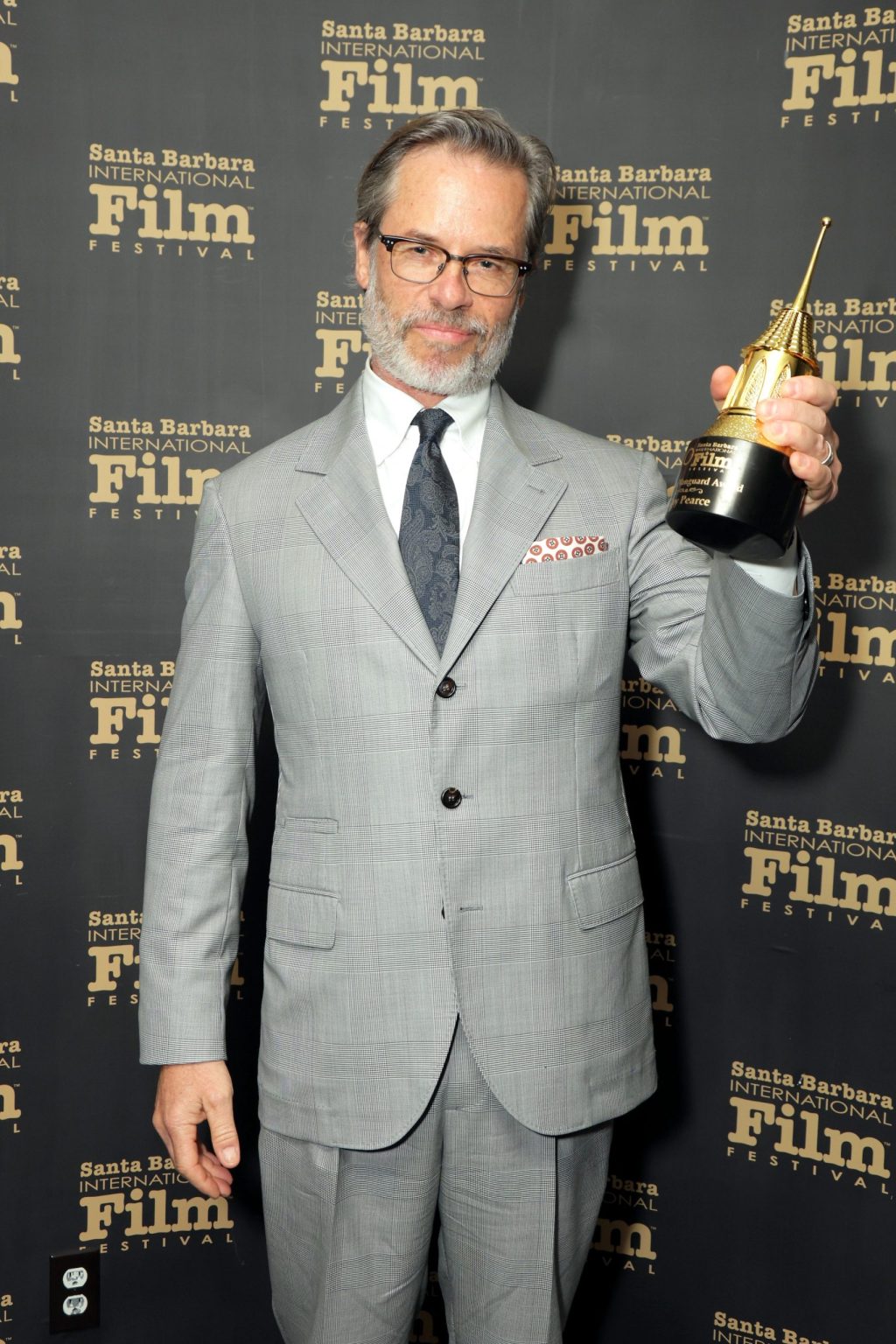 SANTA BARBARA, CALIFORNIA - FEBRUARY 13: Honoree Guy Pearce poses with the Cinema Vanguard Award during the 40th Santa Barbara International Film Festival at The Arlington Theatre on February 13, 2025 in Santa Barbara, California. (Photo by Rebecca Sapp/Getty Images for Santa Barbara International Film Festival)