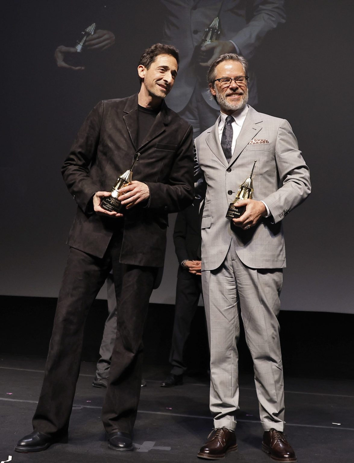 SANTA BARBARA, CALIFORNIA - FEBRUARY 13: Adrien Brody and Guy Pearce attend the Cinema Vanguard Award ceremony during the 40th Santa Barbara International Film Festival at The Arlington Theatre on February 13, 2025 in Santa Barbara, California. (Photo by Tibrina Hobson/Getty Images for Santa Barbara International Film Festival)