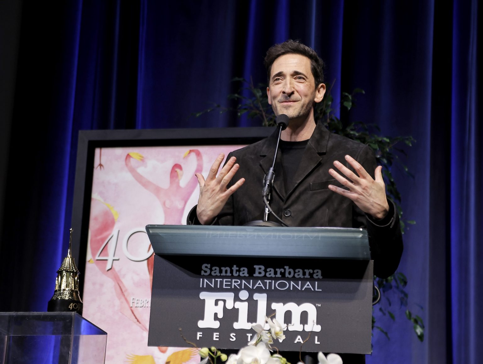 SANTA BARBARA, CALIFORNIA - FEBRUARY 13: Adrien Brody receives the Cinema Vanguard Award during the 40th Santa Barbara International Film Festival at The Arlington Theatre on February 13, 2025 in Santa Barbara, California. (Photo by Tibrina Hobson/Getty Images for Santa Barbara International Film Festival)