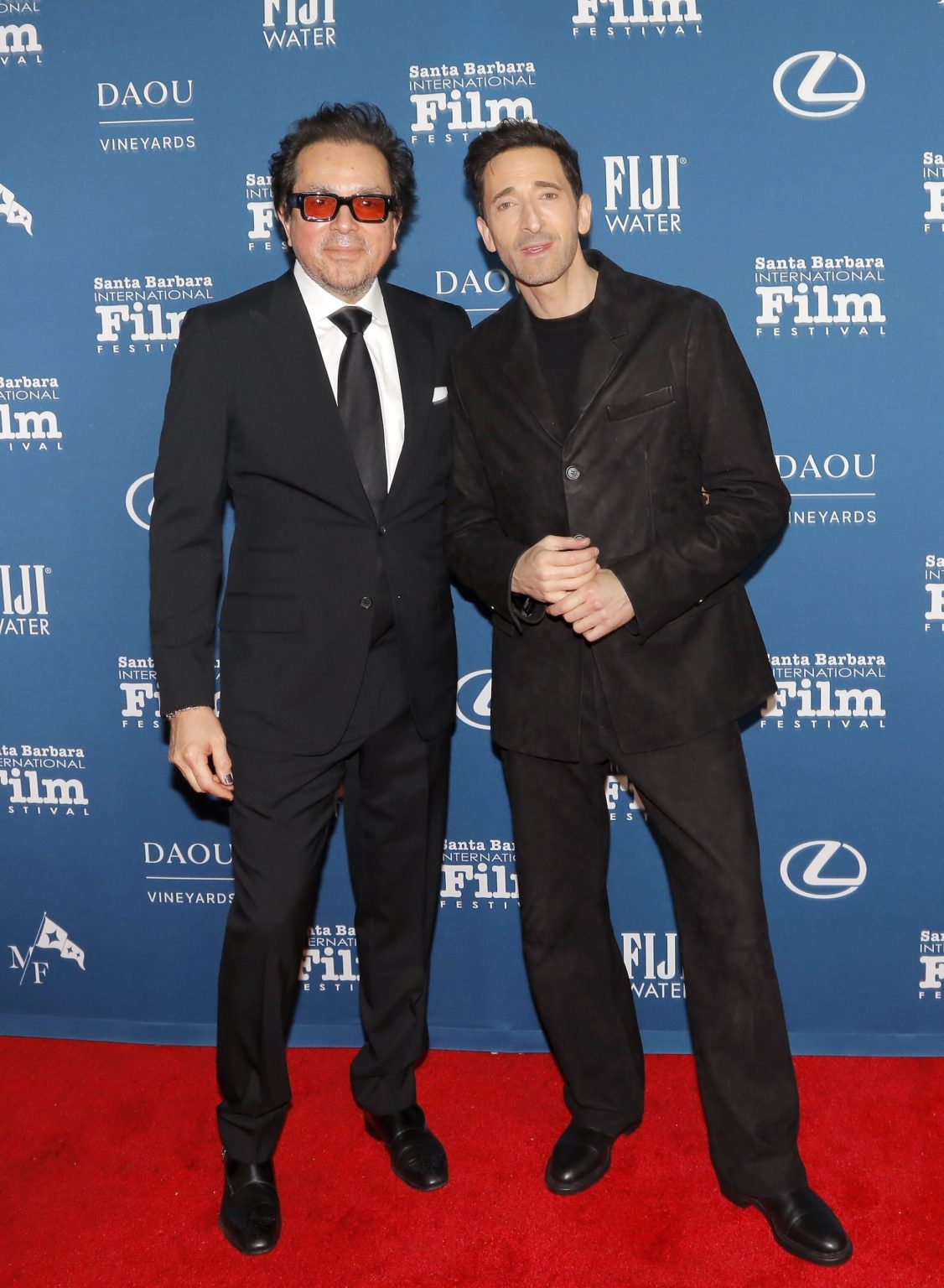 SANTA BARBARA, CALIFORNIA - FEBRUARY 13: SBIFF Executive Director Roger Durling and Honoree Adrien Brody attend the Cinema Vanguard Award ceremony during the 40th Santa Barbara International Film Festival at The Arlington Theatre on February 13, 2025 in Santa Barbara, California. (Photo by Tibrina Hobson/Getty Images for Santa Barbara International Film Festival)