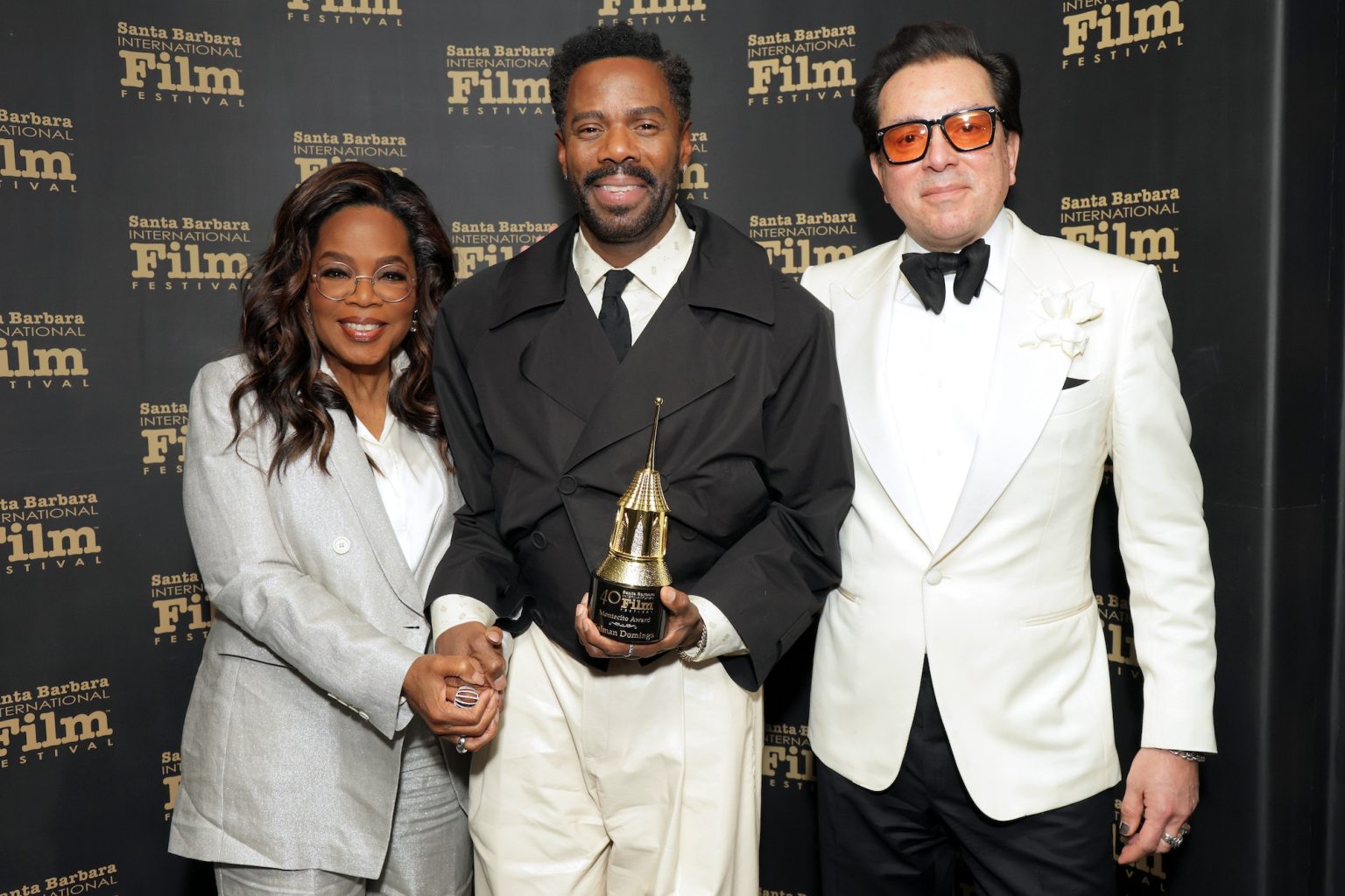 SANTA BARBARA, CALIFORNIA - FEBRUARY 14: (L-R) Oprah Winfrey, Colman Domingo, and SBIFF Executive Director Roger Durling pose with the Montecito Award during the 40th Santa Barbara International Film Festival at The Arlington Theatre on February 14, 2025 in Santa Barbara, California. (Photo by Rebecca Sapp/Getty Images for Santa Barbara International Film Festival)