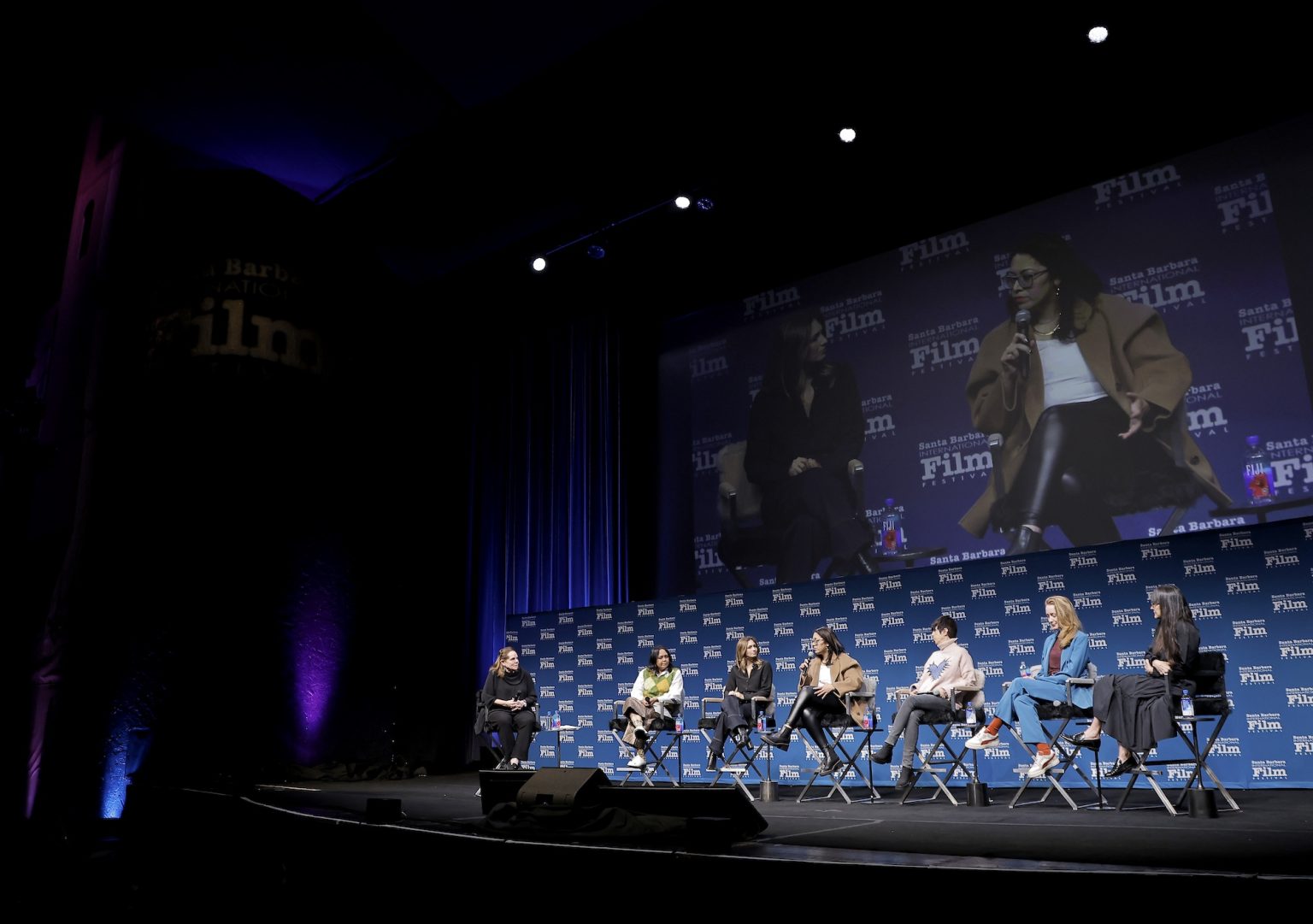 SANTA BARBARA, CALIFORNIA - FEBRUARY 15: (L-R) Madelyn Hammond, Suchitra Mattai, Emily Kassie, Smriti Mundhra, Diane Warren, Victoria Warmerdam and Paula DuPré Pesmen speak onstage at the Women's Panel durning the 40th Santa Barbara International Film Fest on February 15, 2025 in Santa Barbara, California. (Photo by Tibrina Hobson/Getty Images for Santa Barbara International Film Festival)
