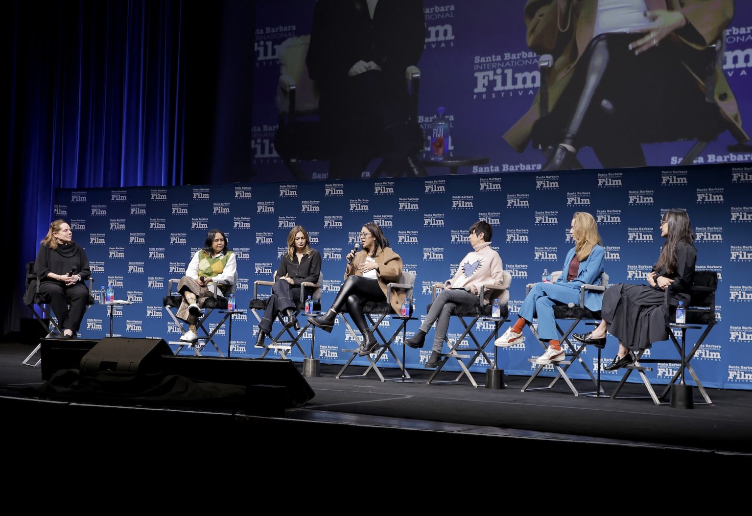 SANTA BARBARA, CALIFORNIA - FEBRUARY 15: (L-R) Madelyn Hammond, Suchitra Mattai, Emily Kassie, Smriti Mundhra, Diane Warren, Victoria Warmerdam and Paula DuPré Pesmen speak onstage at the Women's Panel durning the 40th Santa Barbara International Film Fest on February 15, 2025 in Santa Barbara, California. (Photo by Tibrina Hobson/Getty Images for Santa Barbara International Film Festival)