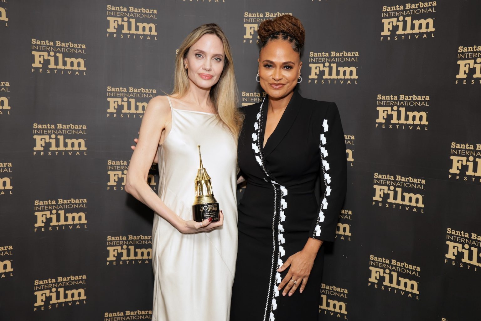 SANTA BARBARA, CALIFORNIA - FEBRUARY 05: Honoree Angelina Jolie and Ava DuVernay pose with the Maltin Modern Master Award during the 40th Santa Barbara International Film Festival at on February 05, 2025 in Santa Barbara, California. (Photo by Rebecca Sapp/Getty Images for Santa Barbara International Film Festival)