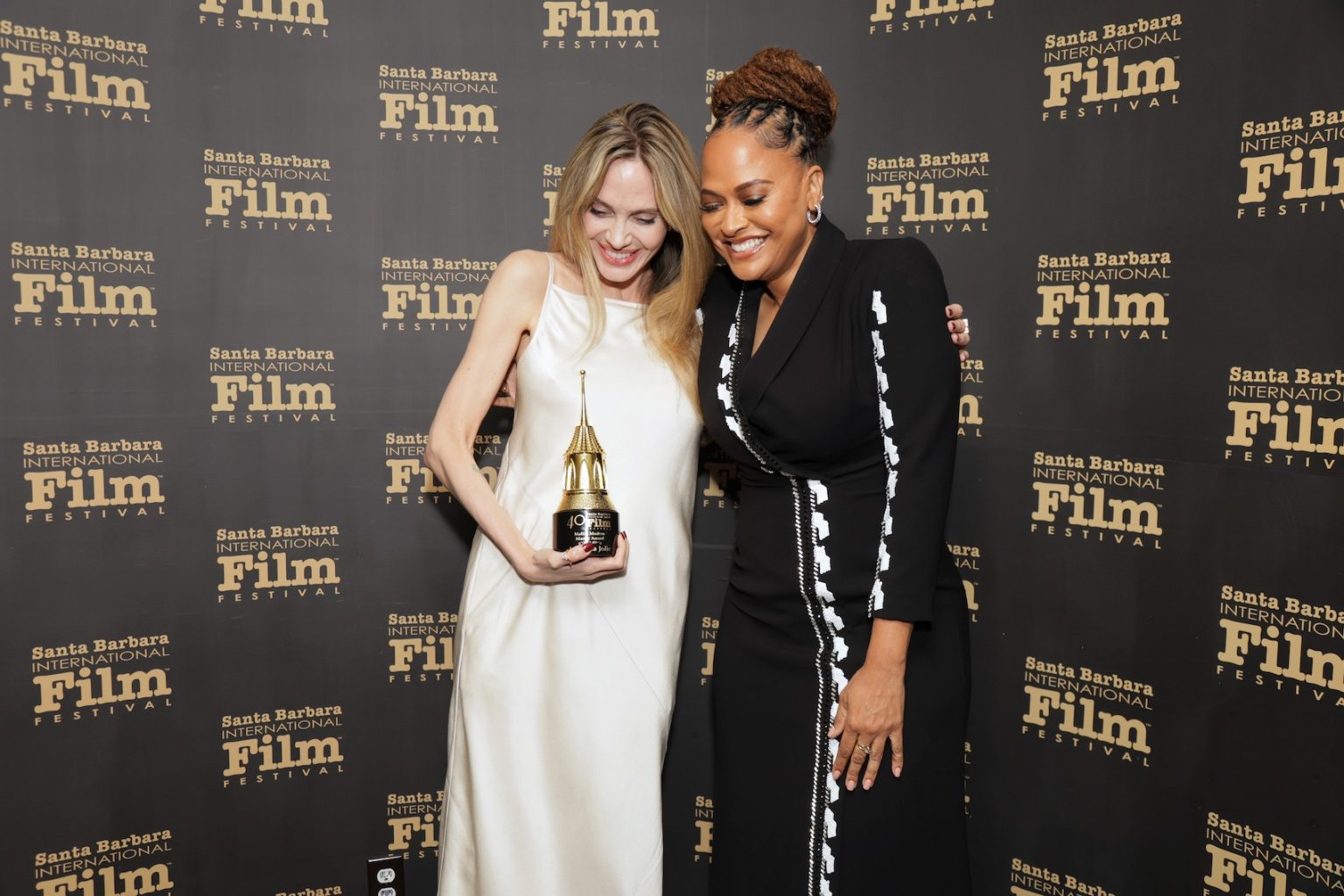 SANTA BARBARA, CALIFORNIA - FEBRUARY 05: Honoree Angelina Jolie and Ava DuVernay pose with the Maltin Modern Master Award during the 40th Santa Barbara International Film Festival at on February 05, 2025 in Santa Barbara, California. (Photo by Rebecca Sapp/Getty Images for Santa Barbara International Film Festival)