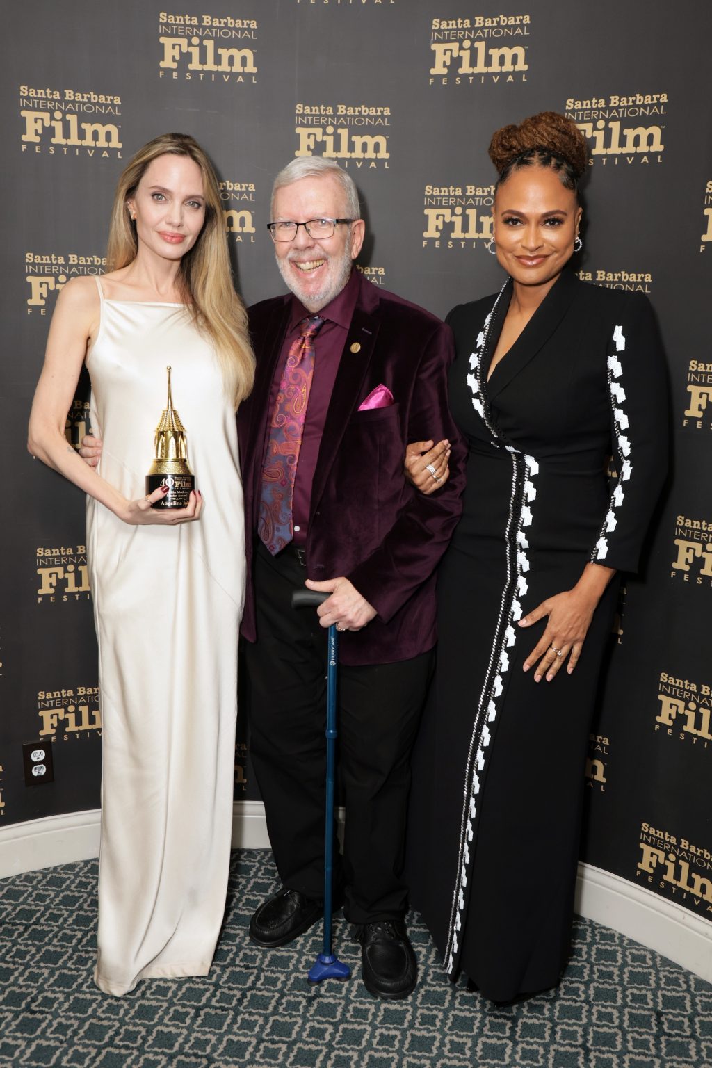 SANTA BARBARA, CALIFORNIA - FEBRUARY 05: (L-R) Honoree Angelina Jolie, Leonard Maltin, and Ava DuVernay pose with the Maltin Modern Master Award during the 40th Santa Barbara International Film Festival at on February 05, 2025 in Santa Barbara, California. (Photo by Rebecca Sapp/Getty Images for Santa Barbara International Film Festival)