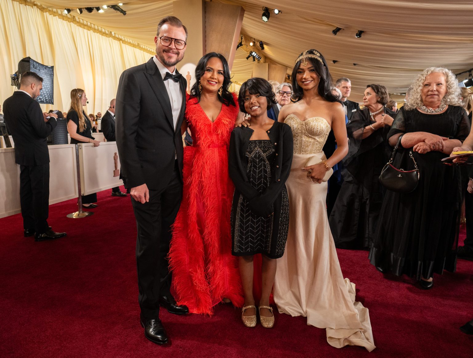 Adam J. Graves, Suchitra Mattai, Ananya Shanbhag and Sabjda Pathan arrive on the red carpet of the 97th Oscars® at the Dolby® Theatre at Ovation Hollywood on Sunday, March 2, 2025.