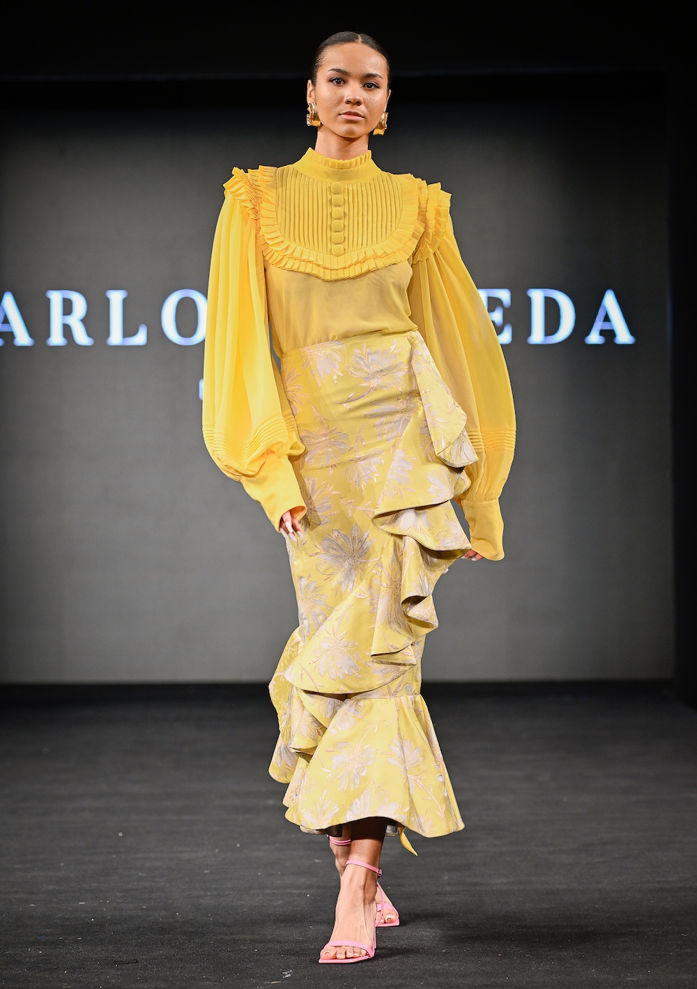 NEW YORK, NEW YORK - FEBRUARY 07: A model walks the runway at the Carlos Pineda show during New York Fashion Week Powered By Art Hearts Fashion at The Angel Orensanz Foundation on February 07, 2025 in New York City. (Photo by Arun Nevader/Getty Images for Art Hearts Fashion)