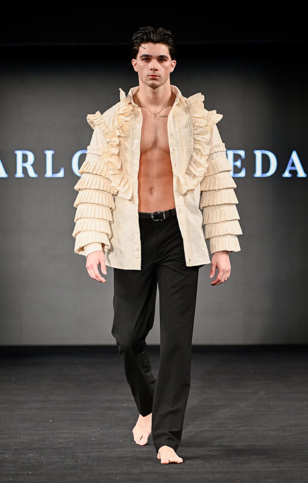NEW YORK, NEW YORK - FEBRUARY 07: A model walks the runway at the Carlos Pineda show during New York Fashion Week Powered By Art Hearts Fashion at The Angel Orensanz Foundation on February 07, 2025 in New York City. (Photo by Arun Nevader/Getty Images for Art Hearts Fashion)