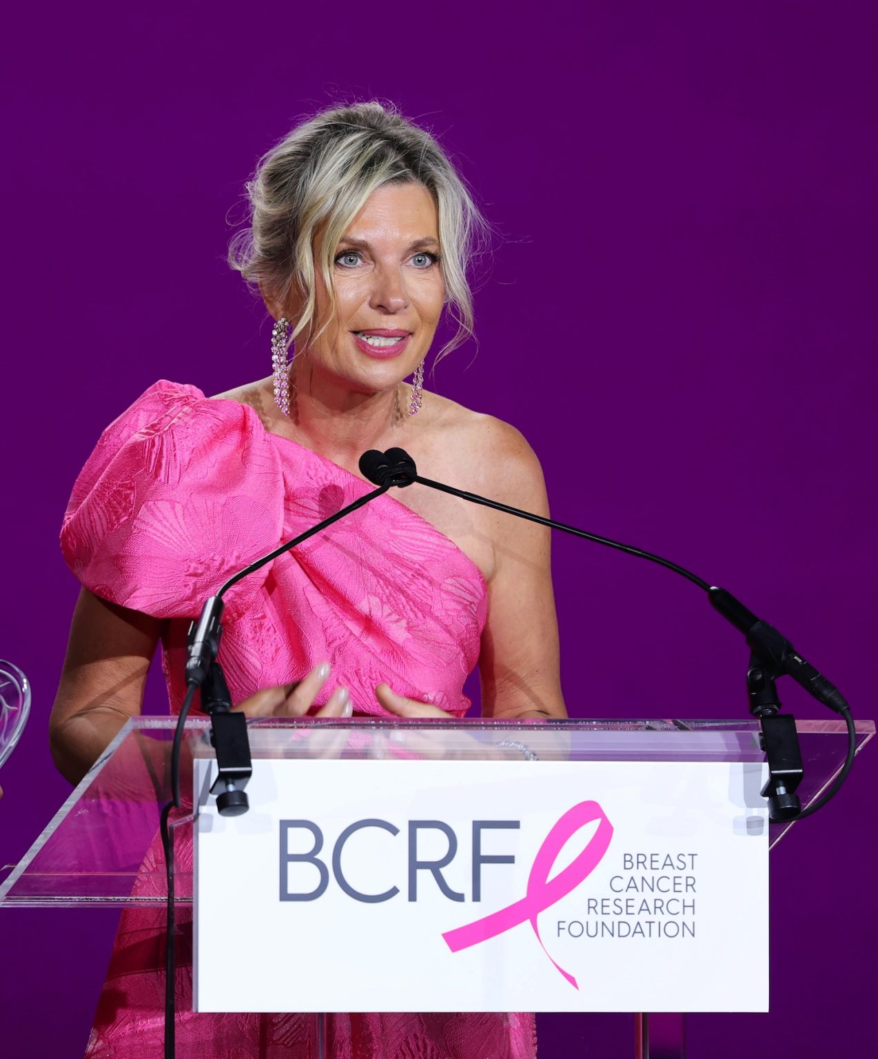 NEW YORK, NEW YORK - MAY 13: (L-R) Peter Cancro and Tatiana Cancro speak onstage during the Breast Cancer Research Foundation Hot Pink Party 2025 at The Glasshouse on May 13, 2025 in New York City. (Photo by Dimitrios Kambouris/Getty Images for Breast Cancer Research Foundation)