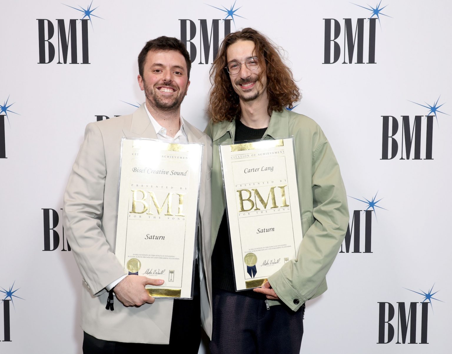 BEVERLY HILLS, CALIFORNIA - MAY 13: (L-R) Rob Bisel and Carter Lang, recipients of BMI Pop Awards for "Saturn," attend the 2025 BMI Pop Awards at Beverly Wilshire, A Four Seasons Hotel, on May 13, 2025 in Beverly Hills, California. (Photo by JC Olivera/Getty Images for BMI)