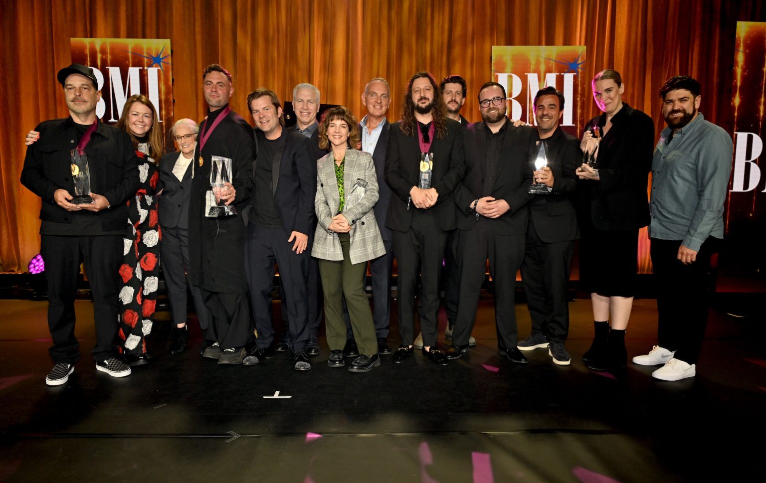 BEVERLY HILLS, CALIFORNIA - MAY 13: Barbara Cane, Vice President, Worldwide Creative, BMI, and Advisor to Executive Vice President, Chief Revenue & Creative Officer, BMI (3rd L), Mike Steinberg, Executive Vice President, Chief Revenue & Creative Officer, BMI (6th L), and Mke O'Neill, President & CEO, BMI (C) present the Song of the Year award for "Lose Control" to winners such as Julian Bunetta, Katie Welle, SVP, A&R, Sony ATV Music Publishing, and Marco Antonio Rodriguez-Diaz, Jr. AKA DJ Infamous onstage during the 2025 BMI Pop Awards at Beverly Wilshire, A Four Seasons Hotel, on May 13, 2025 in Beverly Hills, California. (Photo by Lester Cohen/Getty Images for BMI)