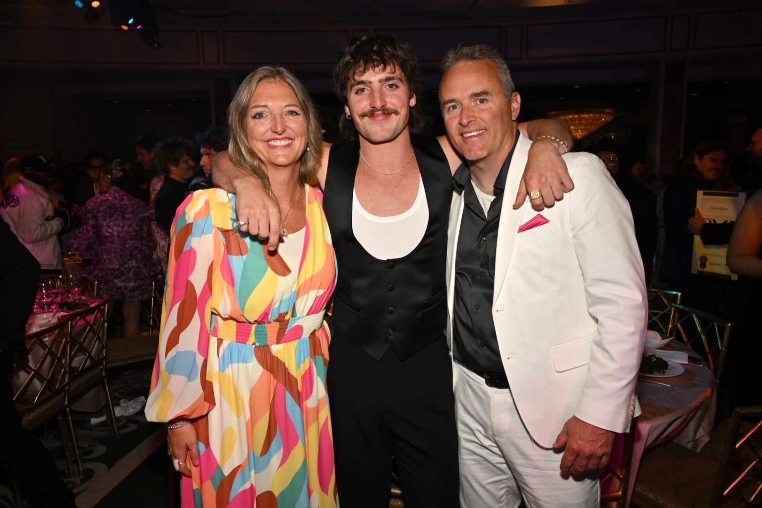 BEVERLY HILLS, CALIFORNIA - MAY 13: (L-R) Kerry Boone, Benson Boone, and Nate Boone attend the 2025 BMI Pop Awards at Beverly Wilshire, A Four Seasons Hotel, on May 13, 2025 in Beverly Hills, California. (Photo by Lester Cohen/Getty Images for BMI)