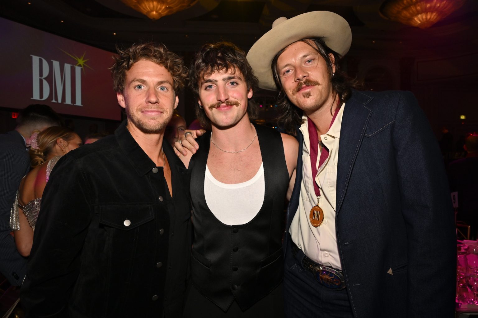 BEVERLY HILLS, CALIFORNIA - MAY 13: (L-R) Evan Blair, Benson Boone and Jack LaFrantz attend the 2025 BMI Pop Awards at Beverly Wilshire, A Four Seasons Hotel, on May 13, 2025 in Beverly Hills, California. (Photo by Lester Cohen/Getty Images for BMI)