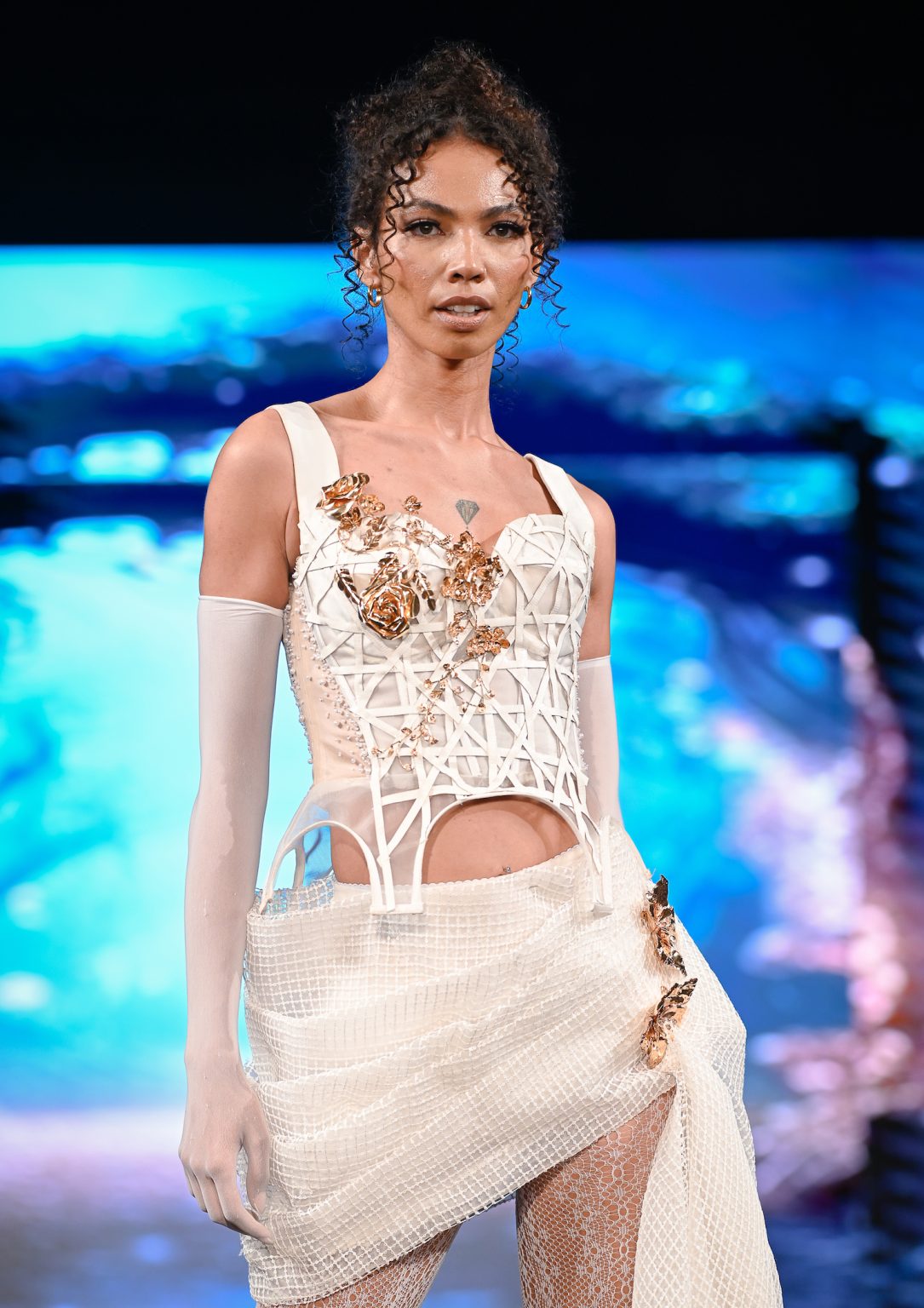 NEW YORK, NEW YORK - FEBRUARY 06: A model walks the runway at the Diana Couture show during New York Fashion Week Powered By Art Hearts Fashion at The Angel Orensanz Foundation on February 06, 2025 in New York City. (Photo by Arun Nevader/Getty Images for Art Hearts Fashion)