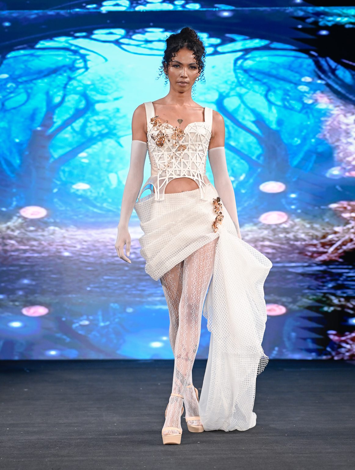 NEW YORK, NEW YORK - FEBRUARY 06: A model walks the runway at the Diana Couture show during New York Fashion Week Powered By Art Hearts Fashion at The Angel Orensanz Foundation on February 06, 2025 in New York City. (Photo by Arun Nevader/Getty Images for Art Hearts Fashion)