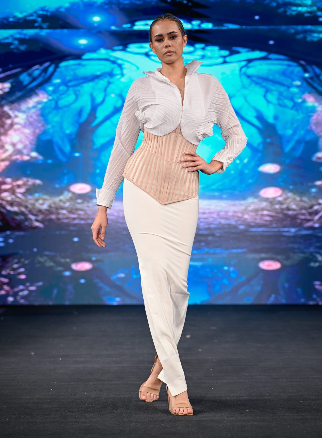 NEW YORK, NEW YORK - FEBRUARY 06: A model walks the runway at the Diana Couture show during New York Fashion Week Powered By Art Hearts Fashion at The Angel Orensanz Foundation on February 06, 2025 in New York City. (Photo by Arun Nevader/Getty Images for Art Hearts Fashion)