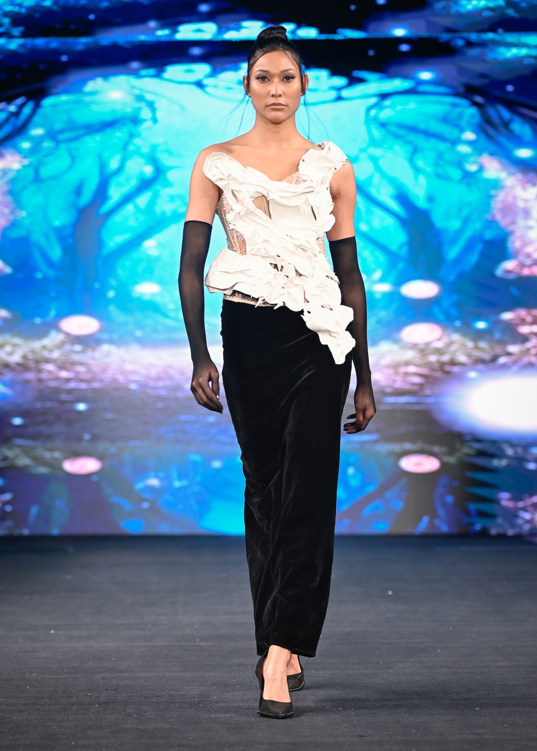 NEW YORK, NEW YORK - FEBRUARY 06: A model walks the runway at the Diana Couture show during New York Fashion Week Powered By Art Hearts Fashion at The Angel Orensanz Foundation on February 06, 2025 in New York City. (Photo by Arun Nevader/Getty Images for Art Hearts Fashion)