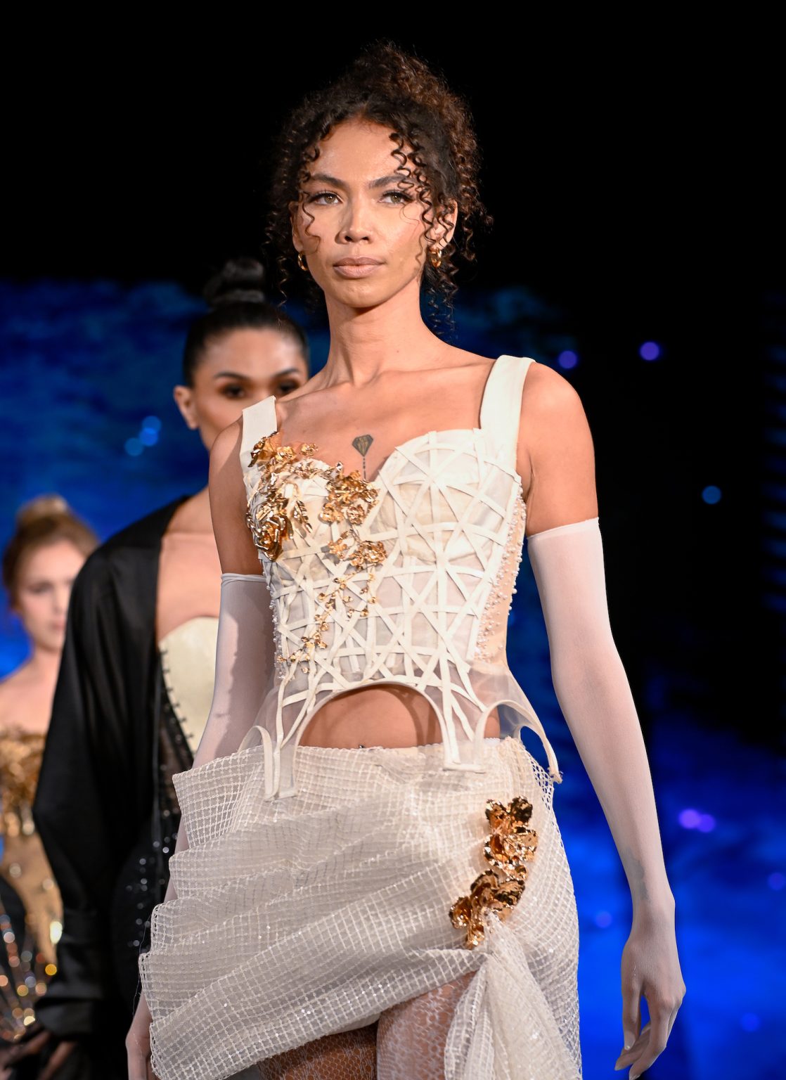 NEW YORK, NEW YORK - FEBRUARY 06: A model walks the runway at the Diana Couture show during New York Fashion Week Powered By Art Hearts Fashion at The Angel Orensanz Foundation on February 06, 2025 in New York City. (Photo by Arun Nevader/Getty Images for Art Hearts Fashion)