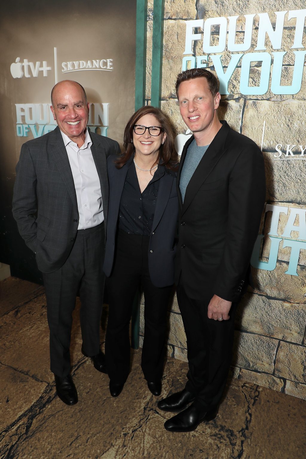 New York, New York - 5/19/25 - (L-R) Don Granger, Dana Goldberg, and David Ellison (Producers Skydance) attends the World Premiere screening of Apple Original Films’ “Fountain of Youth” at the American Museum of Natural History. “Fountain of Youth” streams globally on Apple TV+ on Friday, May 23, 2025. -PICTURED: (L-R) Don Granger, Dana Goldberg, and David Ellison (Producers Skydance) - PHOTO by: Marion Curtis / Starpix for Apple Original Films - Location: American Museum of Natural History