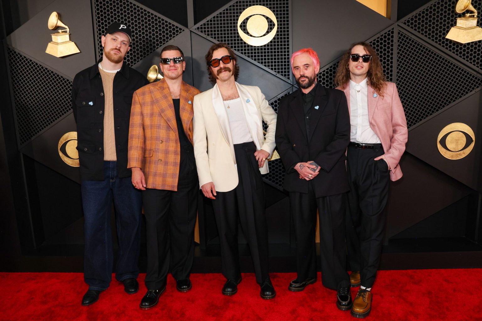 LOS ANGELES, CALIFORNIA - FEBRUARY 02: (L-R) Kenny Beats and Jon Beavis, Mark Bowen, Joe Talbot, and Lee Kiernan of Idles attend the 67th Annual GRAMMY Awards at Crypto.com Arena on February 02, 2025 in Los Angeles, California. (Photo by Kevin Mazur/Getty Images for The Recording Academy)