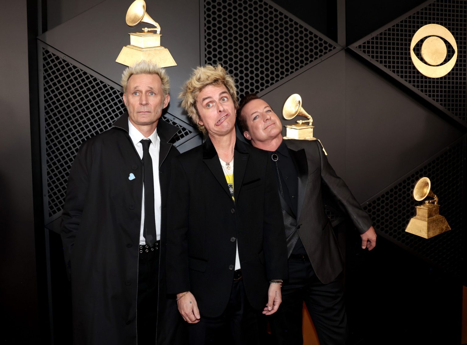 LOS ANGELES, CALIFORNIA - FEBRUARY 02: (L-R) Mike Dirnt, Billie Joe Armstrong, and Tré Cool of Green Day attend the 67th Annual GRAMMY Awards at Crypto.com Arena on February 02, 2025 in Los Angeles, California. (Photo by Kevin Mazur/Getty Images for The Recording Academy)