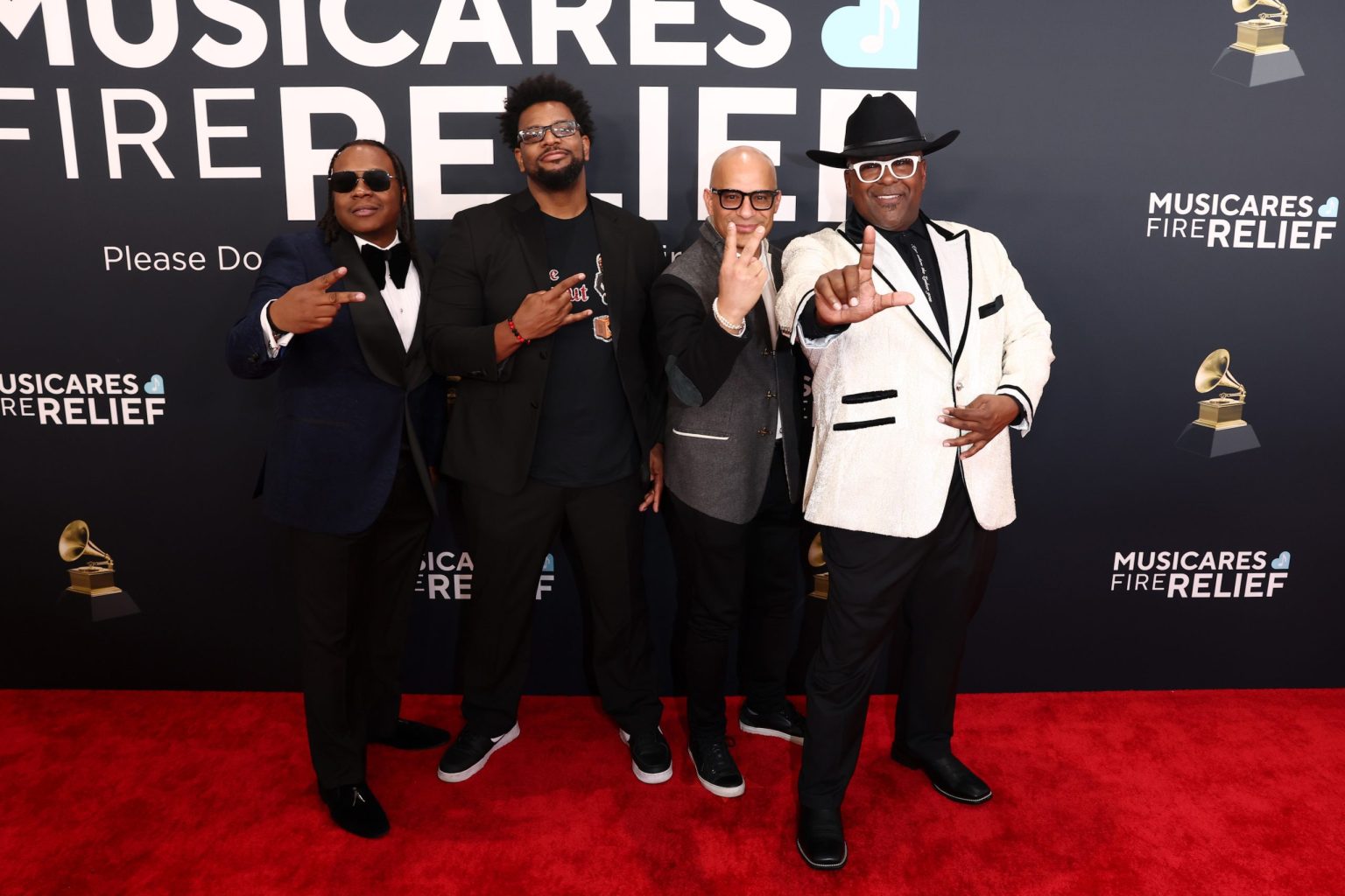 LOS ANGELES, CALIFORNIA - FEBRUARY 02: Sean Ardoin (R) and band Kreole Rock and Soul attend the 67th Annual GRAMMY Awards on February 02, 2025 in Los Angeles, California. (Photo by Matt Winkelmeyer/Getty Images for The Recording Academy)