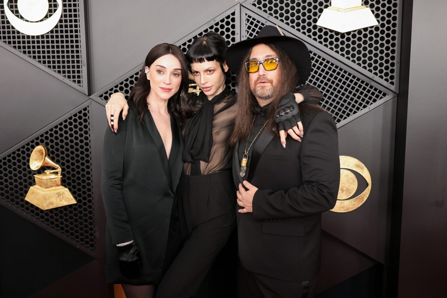 LOS ANGELES, CALIFORNIA - FEBRUARY 02: (EDITORS NOTE: This image contains partial nudity.) (L-R) St. Vincent, Charlotte Kemp Muhl, and Sean Ono Lennon attend the 67th Annual GRAMMY Awards at Crypto.com Arena on February 02, 2025 in Los Angeles, California. (Photo by Neilson Barnard/Getty Images for The Recording Academy)
