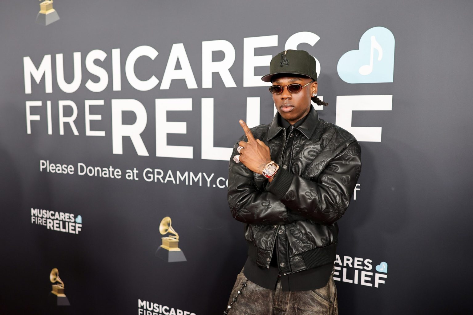 LOS ANGELES, CALIFORNIA - FEBRUARY 02: Rema attends the 67th Annual GRAMMY Awards at Crypto.com Arena on February 02, 2025 in Los Angeles, California. (Photo by Neilson Barnard/Getty Images for The Recording Academy)