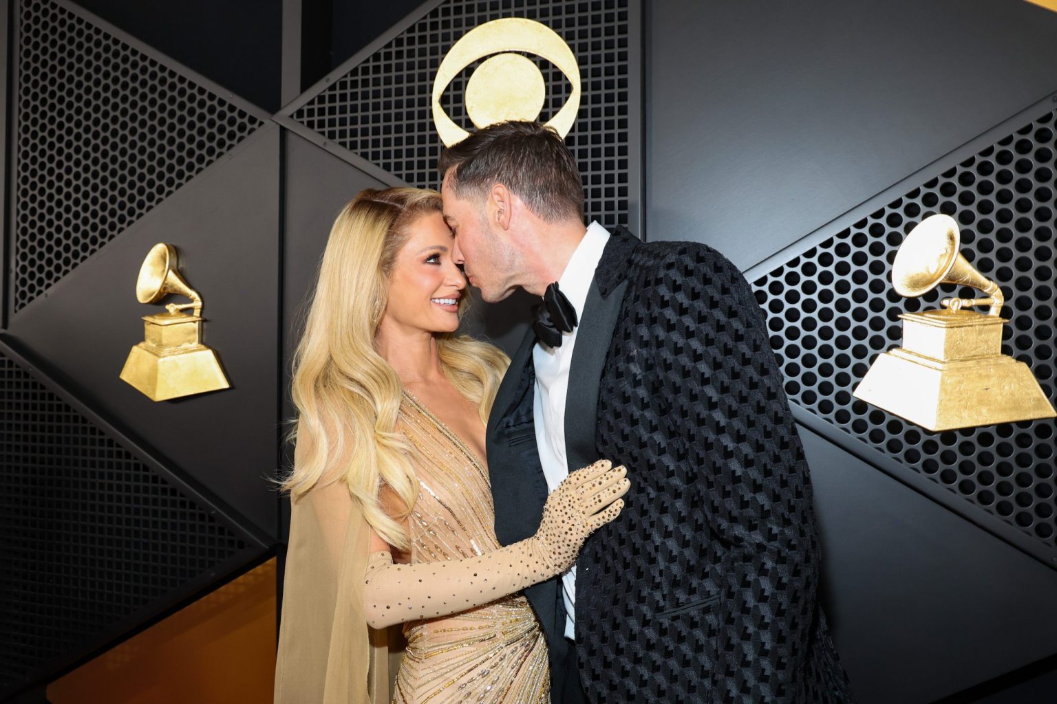 LOS ANGELES, CALIFORNIA - FEBRUARY 02: (L-R) Paris Hilton and Carter Reum attend the 67th Annual GRAMMY Awards at Crypto.com Arena on February 02, 2025 in Los Angeles, California. (Photo by Kevin Mazur/Getty Images for The Recording Academy)