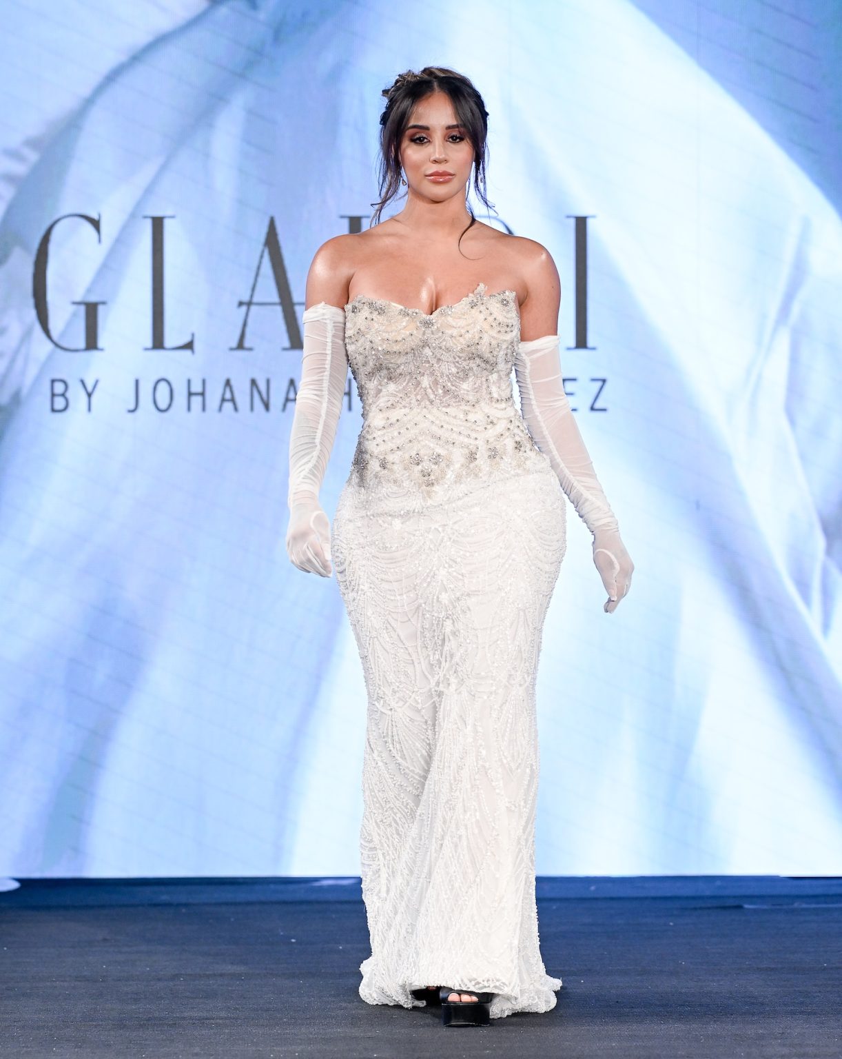 NEW YORK, NEW YORK - FEBRUARY 06: Whitney Clark walks the runway at the Glaudi show during New York Fashion Week Powered By Art Hearts Fashion at The Angel Orensanz Foundation on February 06, 2025 in New York City. (Photo by Arun Nevader/Getty Images for Art Hearts Fashion)