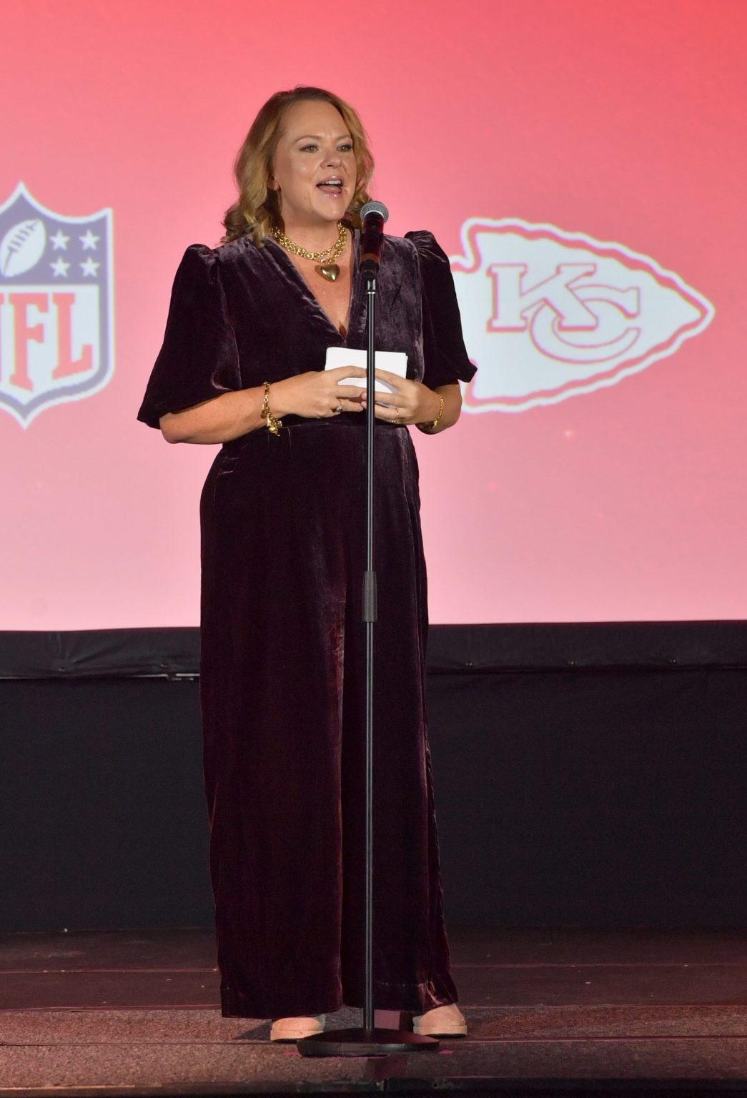 KANSAS CITY, MISSOURI - NOVEMBER 30: Lisa Hamilton Daly speaks onstage at Hallmark's Premiere Screening of Holiday Touchdown: A Chiefs Love Story on November 30, 2024 in Kansas City, Missouri. (Photo by Jason Davis/Getty Images for Hallmark Media)