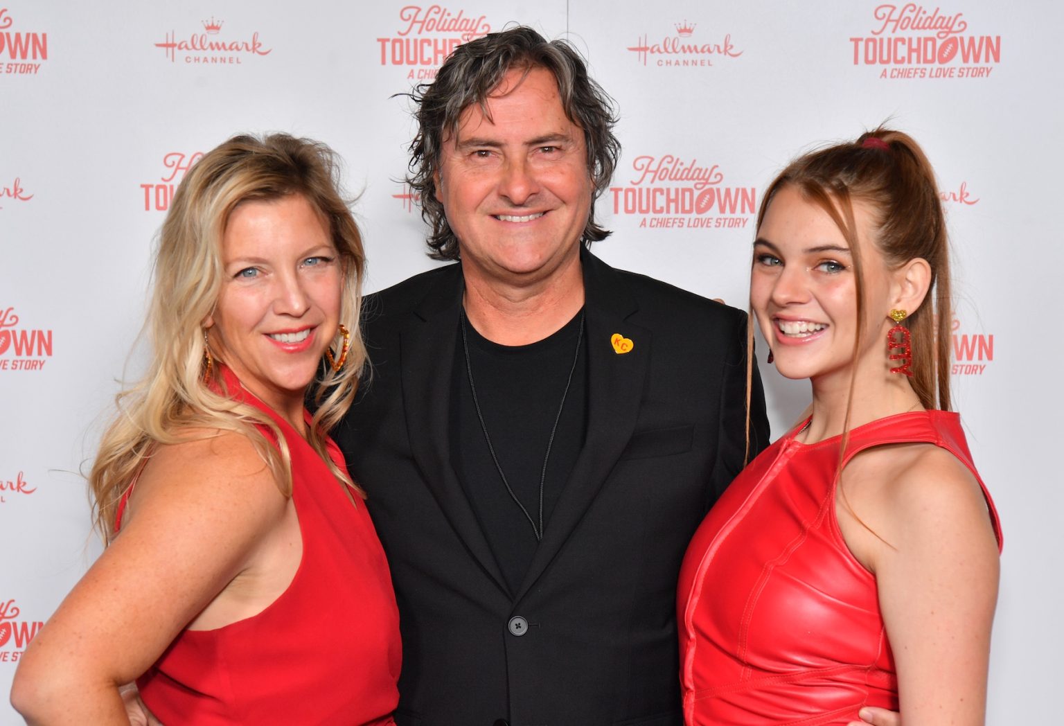 KANSAS CITY, MISSOURI - NOVEMBER 30: (L-R) Lala Lisa, Robert Harris, and Gigi Harris attend Hallmark's Premiere Screening of Holiday Touchdown: A Chiefs Love Story on November 30, 2024 in Kansas City, Missouri. (Photo by Jason Davis/Getty Images for Hallmark Media)
