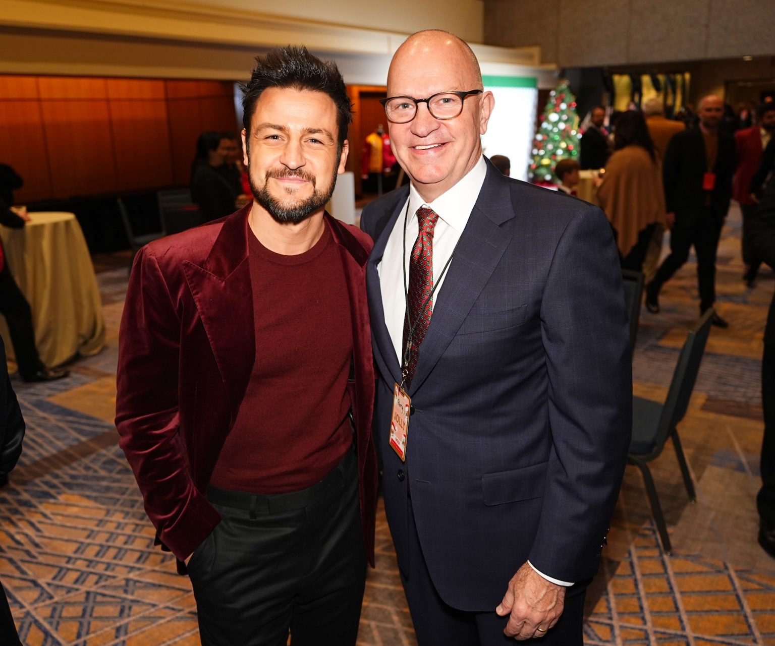 KANSAS CITY, MISSOURI - NOVEMBER 30: (L-R) Tyler Hynes and Mike Perry attend Hallmark's Premiere Screening of Holiday Touchdown: A Chiefs Love Story on November 30, 2024 in Kansas City, Missouri. (Photo by Kyle Rivas/Getty Images for Hallmark Media)