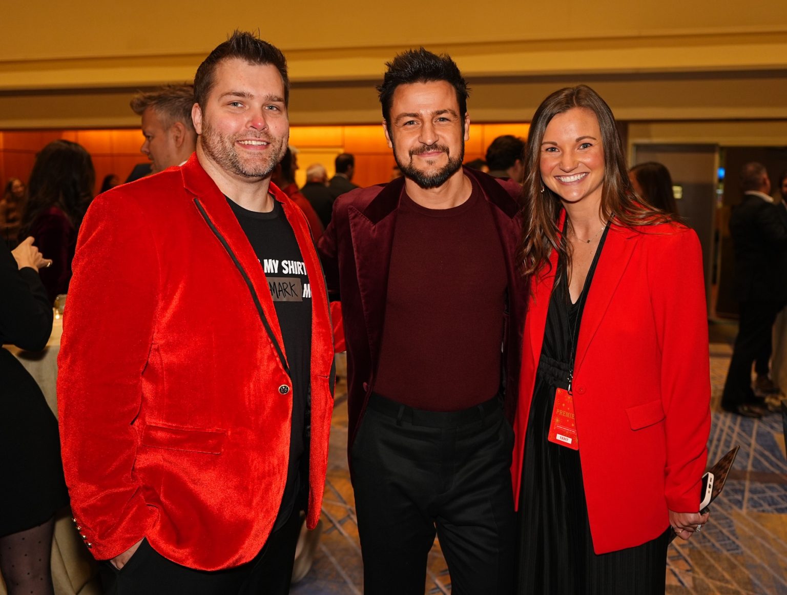 KANSAS CITY, MISSOURI - NOVEMBER 30: (L-R) Mitch Perry, Tyler Hynes and Mallory Perry attend Hallmark's Premiere Screening of Holiday Touchdown: A Chiefs Love Story on November 30, 2024 in Kansas City, Missouri. (Photo by Kyle Rivas/Getty Images for Hallmark Media)
