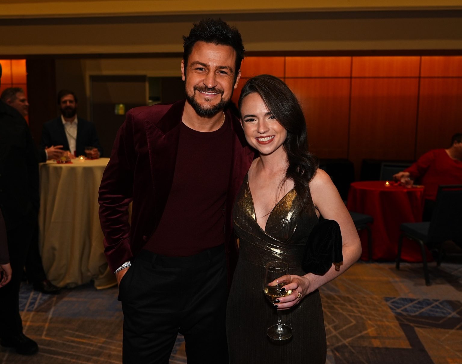 KANSAS CITY, MISSOURI - NOVEMBER 30: (L-R) Tyler Hynes and Candice Dilavore attend Hallmark's Premiere Screening of Holiday Touchdown: A Chiefs Love Story on November 30, 2024 in Kansas City, Missouri. (Photo by Kyle Rivas/Getty Images for Hallmark Media)