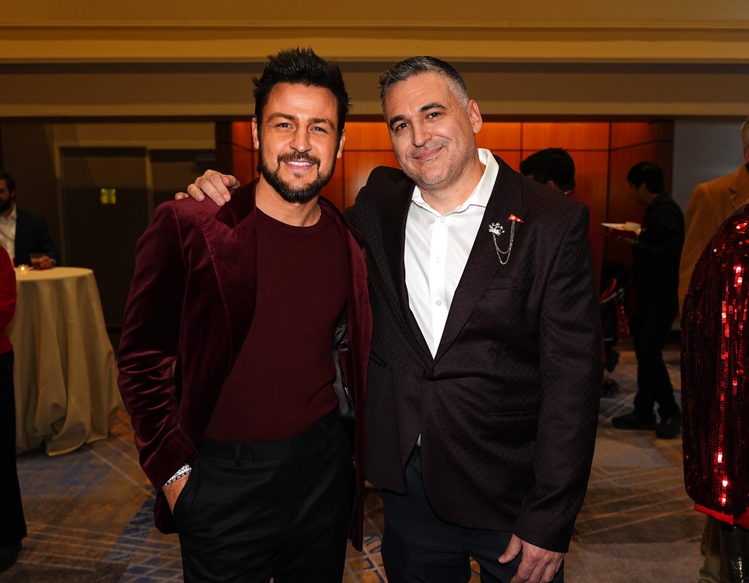 KANSAS CITY, MISSOURI - NOVEMBER 30: (L-R) Tyler Hynes and David Wulf attend Hallmark's Premiere Screening of Holiday Touchdown: A Chiefs Love Story on November 30, 2024 in Kansas City, Missouri. (Photo by Kyle Rivas/Getty Images for Hallmark Media)